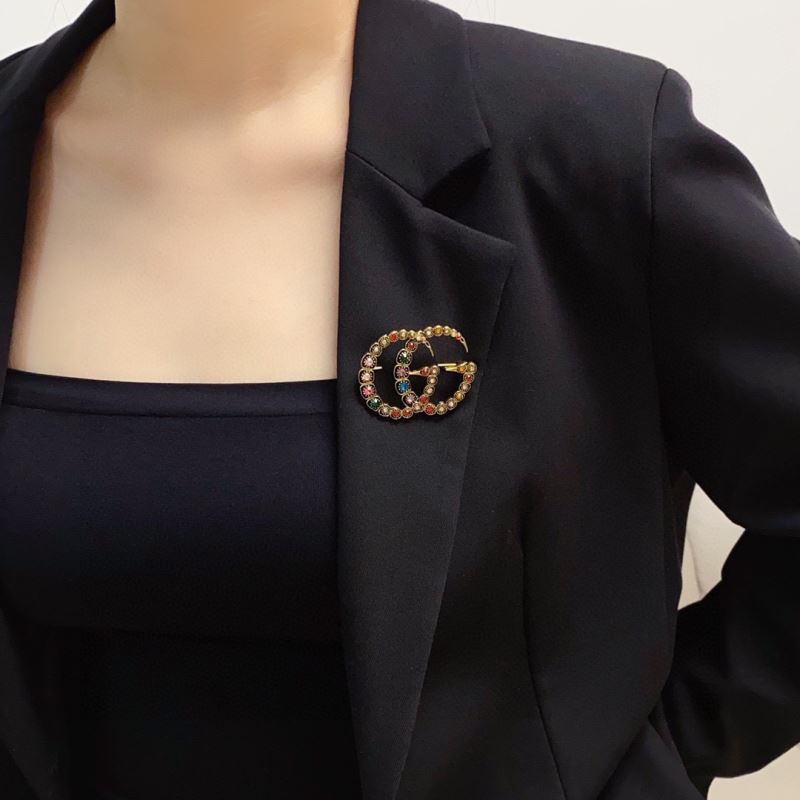 Gvc*1 brooches